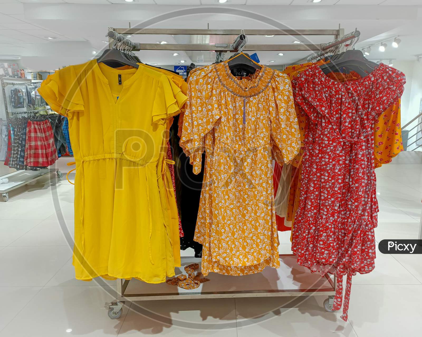 An Eye catching picture of traditional Ladies Indian Kurtis in different Colors and Designs at a Fashion store in Mysuru city of Karnataka state in India.