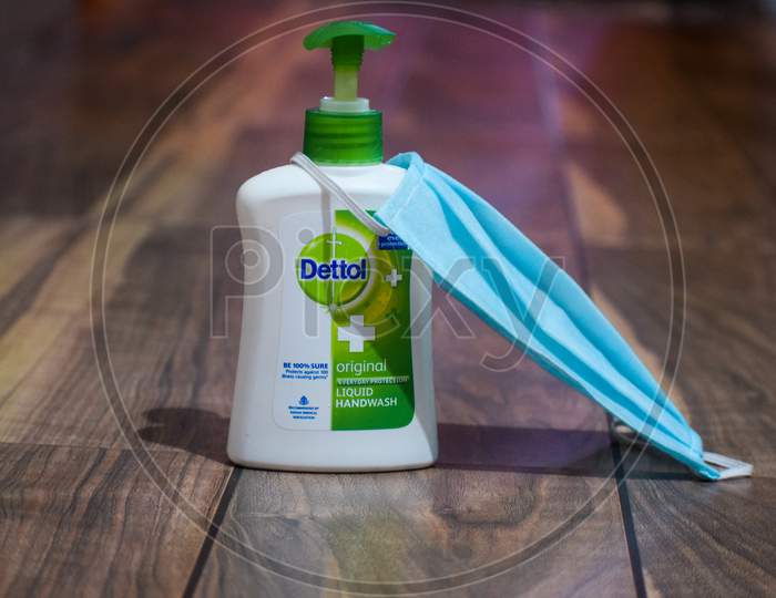 Dettol hand wash with blue face mask.