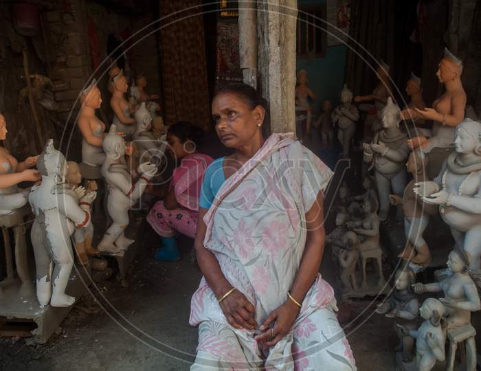 A Shopkeeper Selling Idols