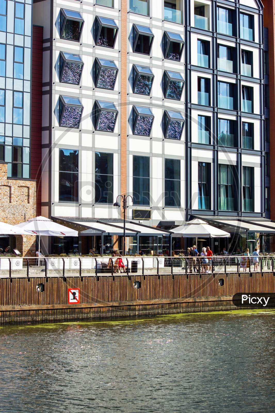 Gdansk, North Poland - August 14, 2020: Building Exterior And Restaurant Located In The Porch Over Motlawa River