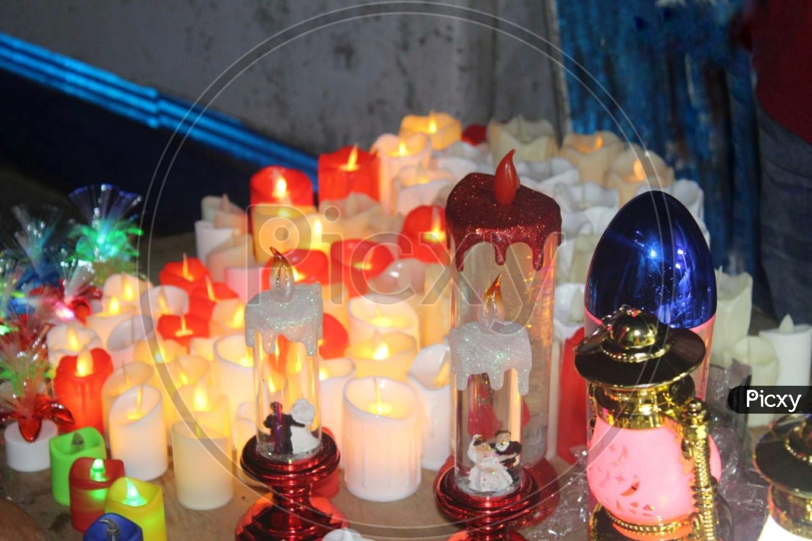 Colourful candles, lanterns and toys