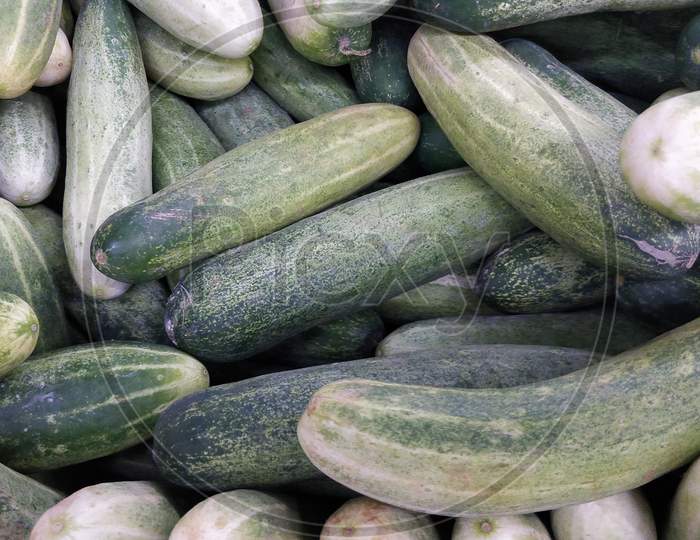 pile of cucumber in market