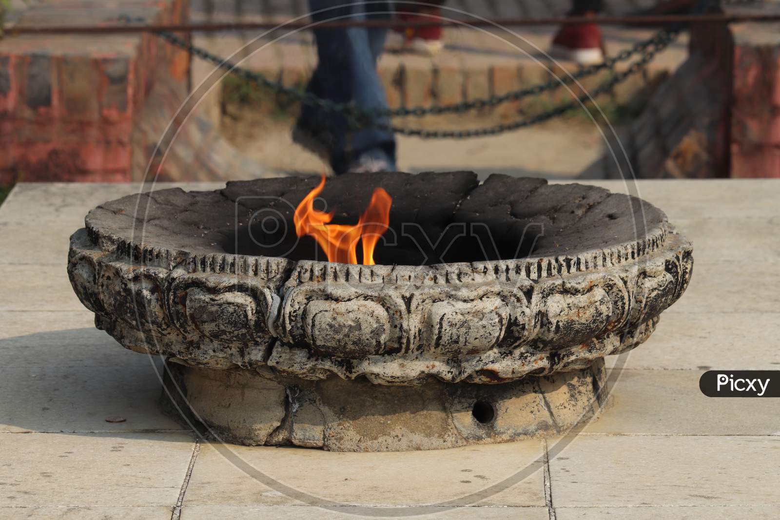 Eternal or Endless flame symbolized peace and harmony at Lumbini, Nepal .