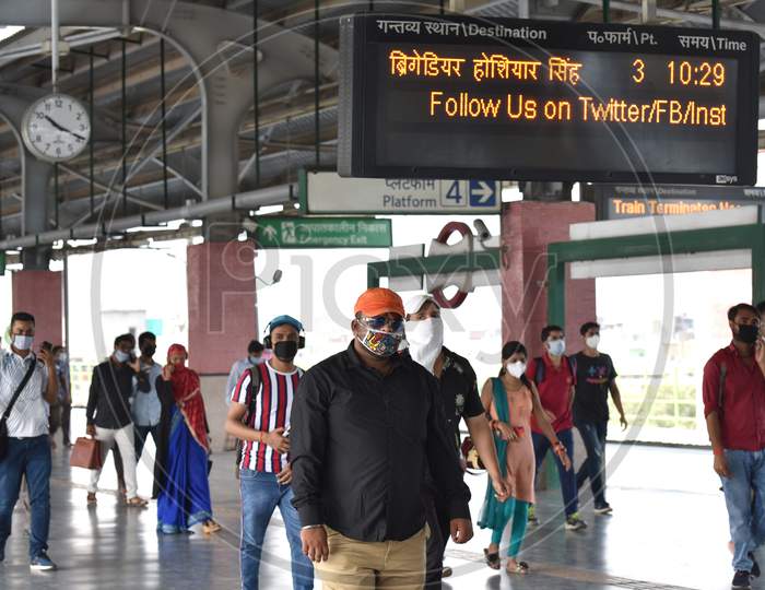 Passengers wearing face masks travel on a Delhi metro train, amidst the spread of coronavirus disease (COVID-19), in New Delhi, India, September 10, 2020.