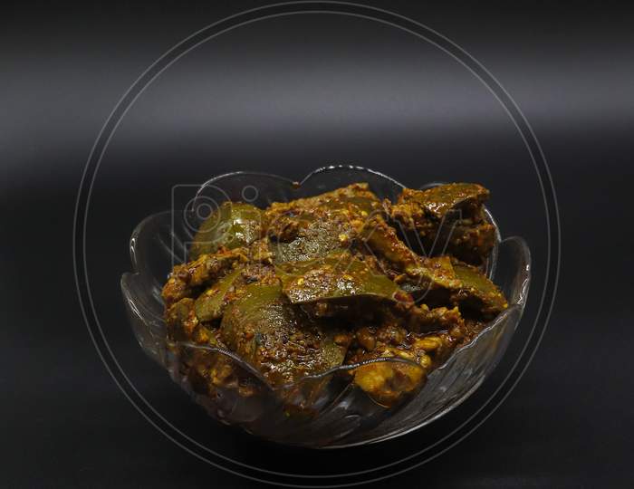 Mango Pickle (Delicious and organic) on black background