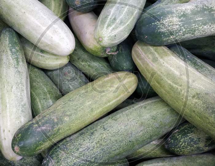 pile of cucumber in market