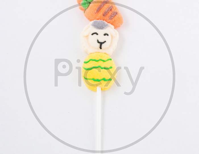 Easter Candy Bunny, Carrot, Lamb And Easter Egg On Lollipop Stick On White.