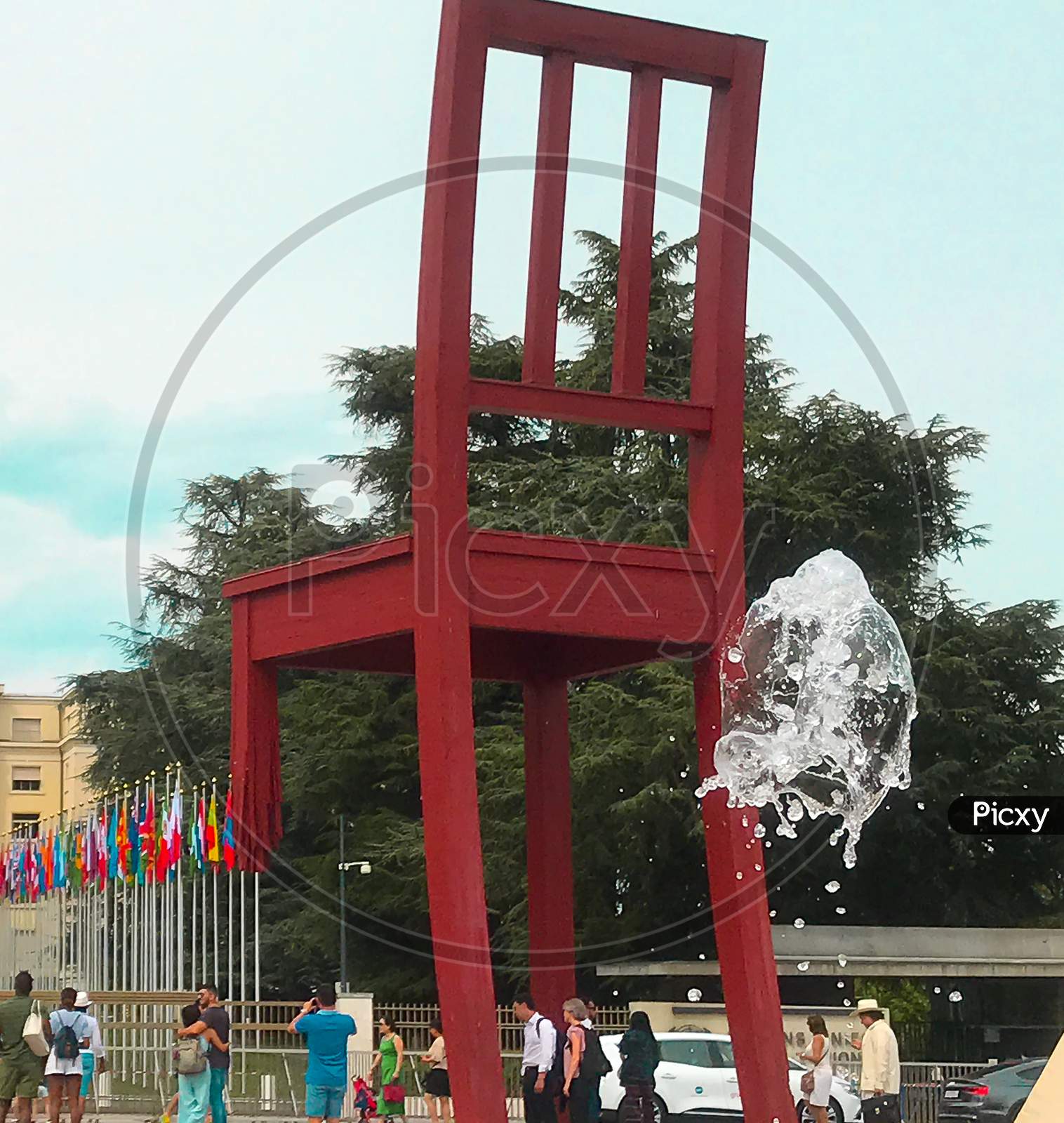 The Broken Chair at Geneva. it symbolise opposition to land mines and cluster bombs, and acts as a reminder to politicians and others others visiting .