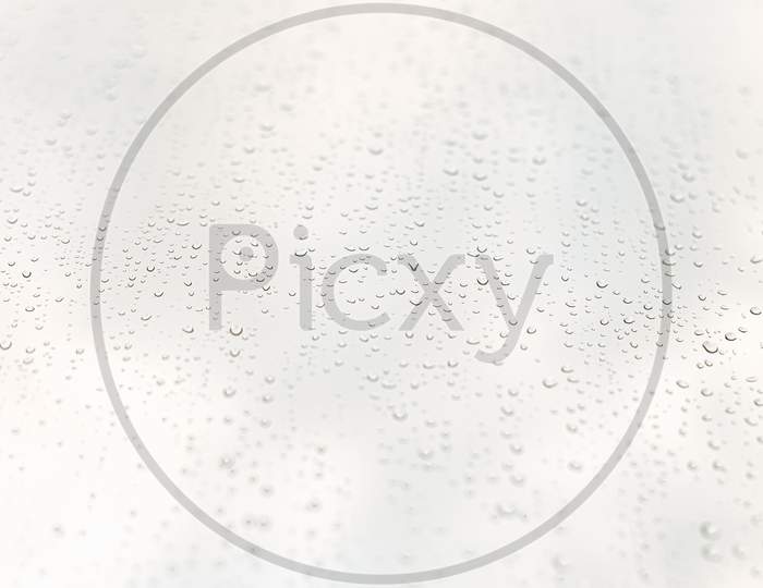Minimalistic And Clean Background With Water Drops Over A Crystal Clear White