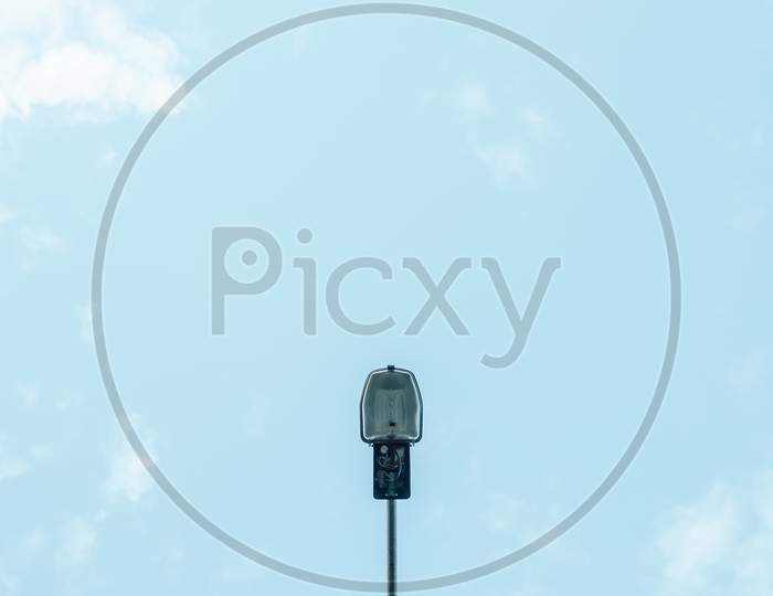 Minimalistic Shot Of A Single Street Lamp With The Sky As The Background