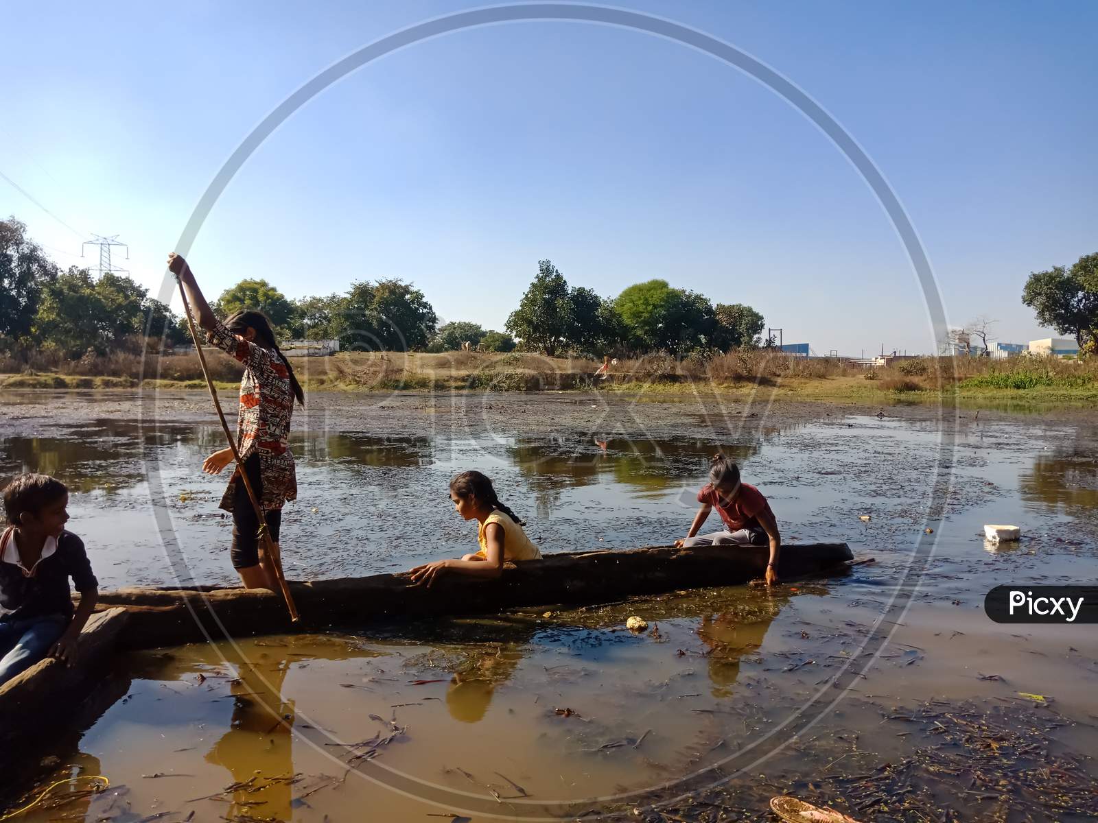 Indian Fisher Kids On Boat.