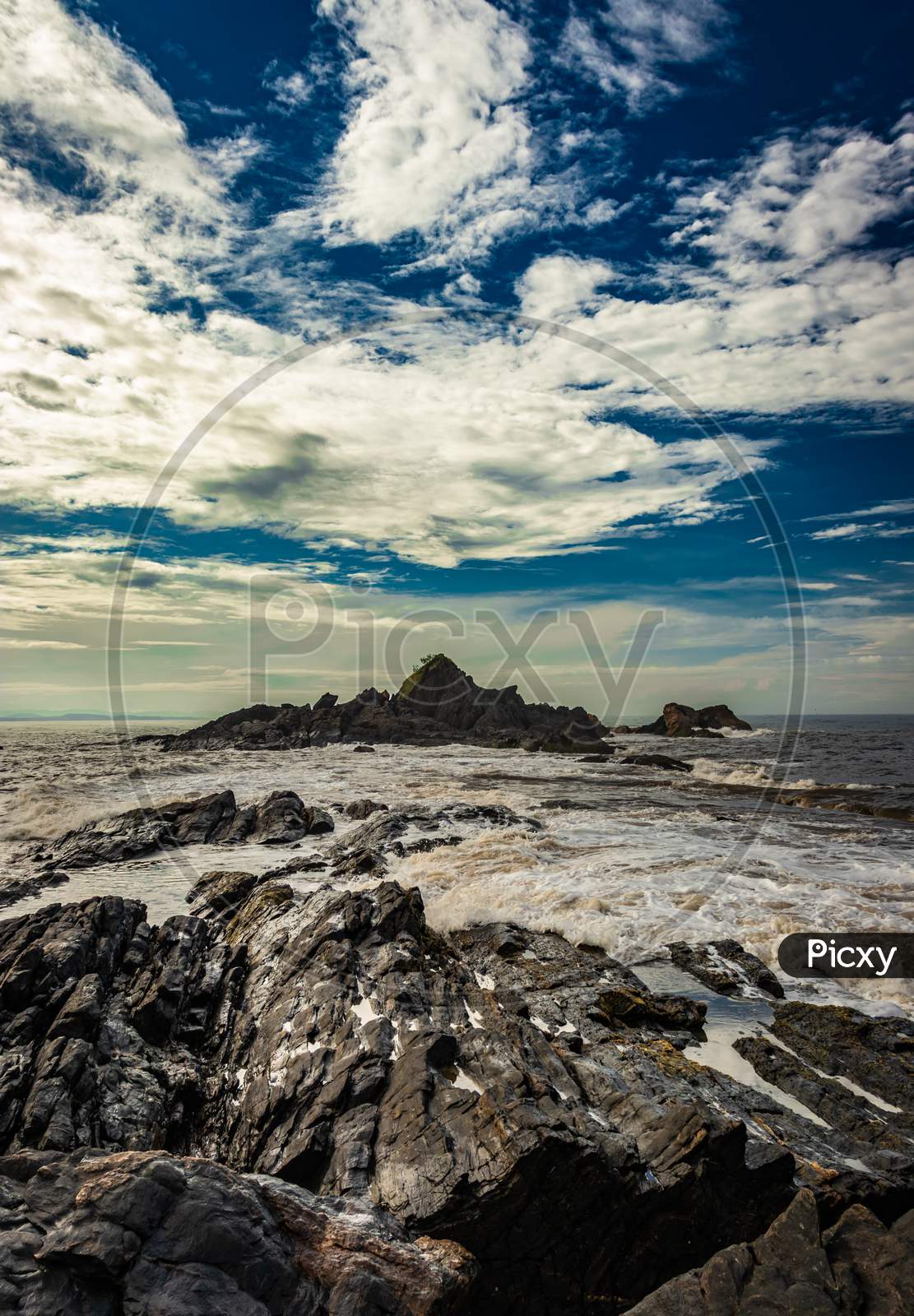 Rocky Sea Beach With Crashing Waves And Amazing Sky At Morning From Flat Angle