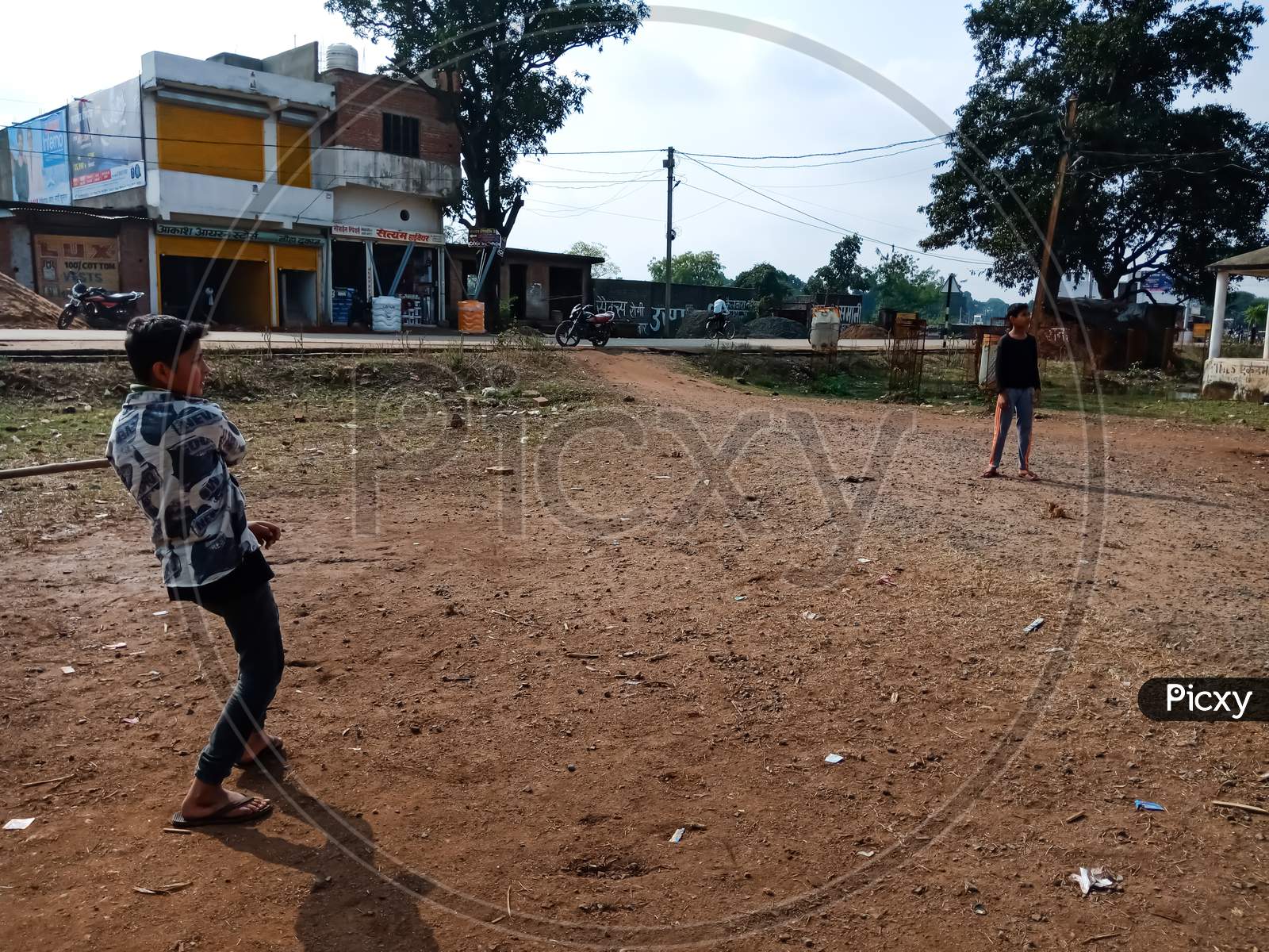 Asian Village Poor Kids Sporty Activity On Field.