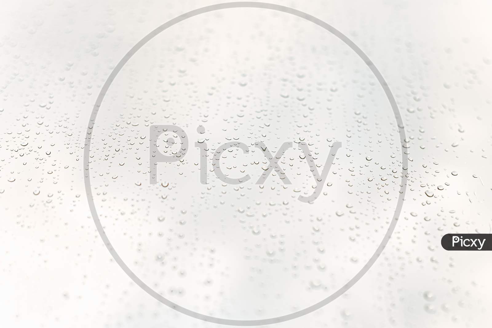 Minimalistic And Clean Background With Water Drops Over A Crystal Clear White
