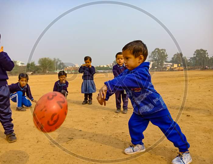 Indian Play School Kids Sport Activity On Ground.