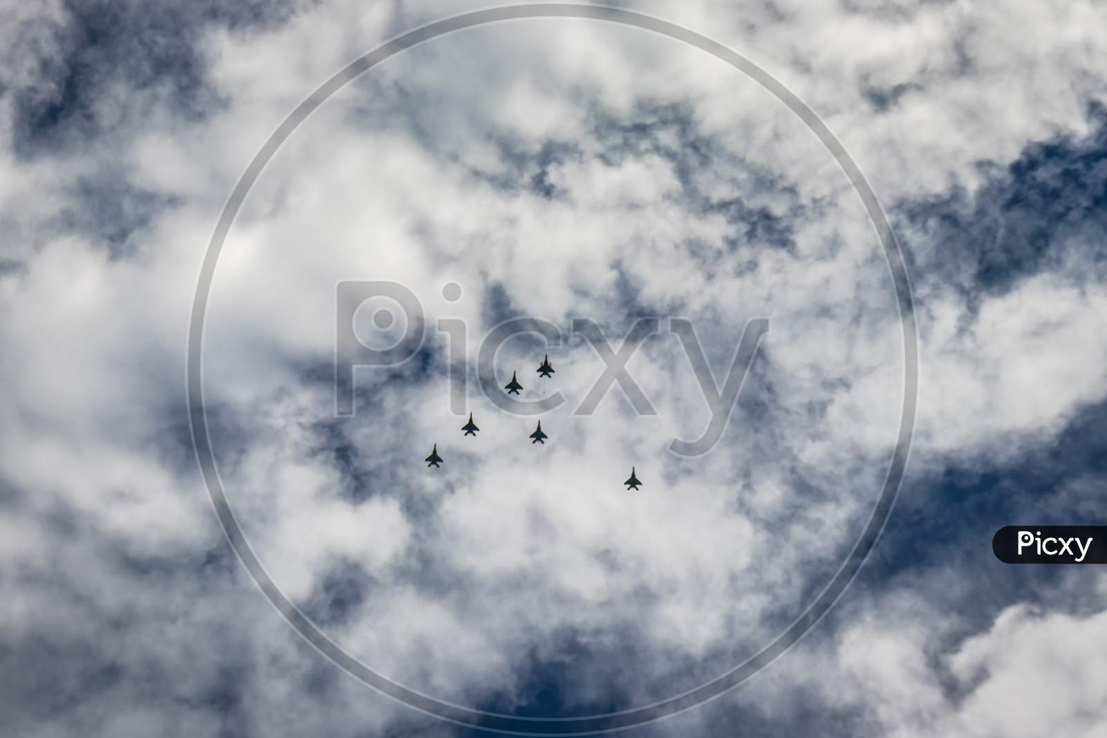 Bright Blue Sky With Jet Fighter Formation Flying