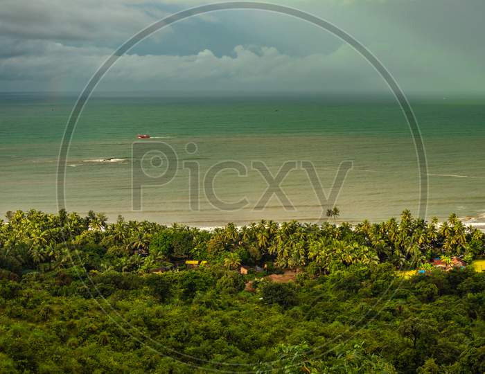 Landscape Serene View With Sea Horizon And Dense Green Forests