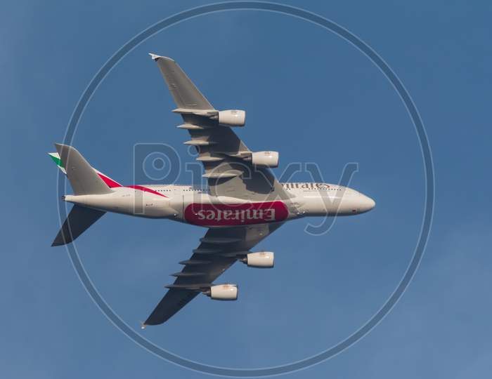 An Emirates Airlines Flight, Super Jumbo A380 Flying High In The Mauritian Sky.