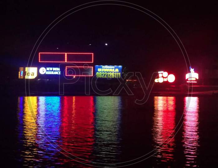 Goa night lights reflection