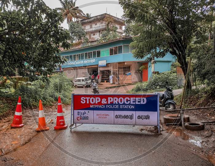 Meppadi, Kerala / India - 09.14.2020 : Road Blocked By Police In Containment Zone After A Person Was Tested Positive For Corona Virus. Covid-19 Pandemic.