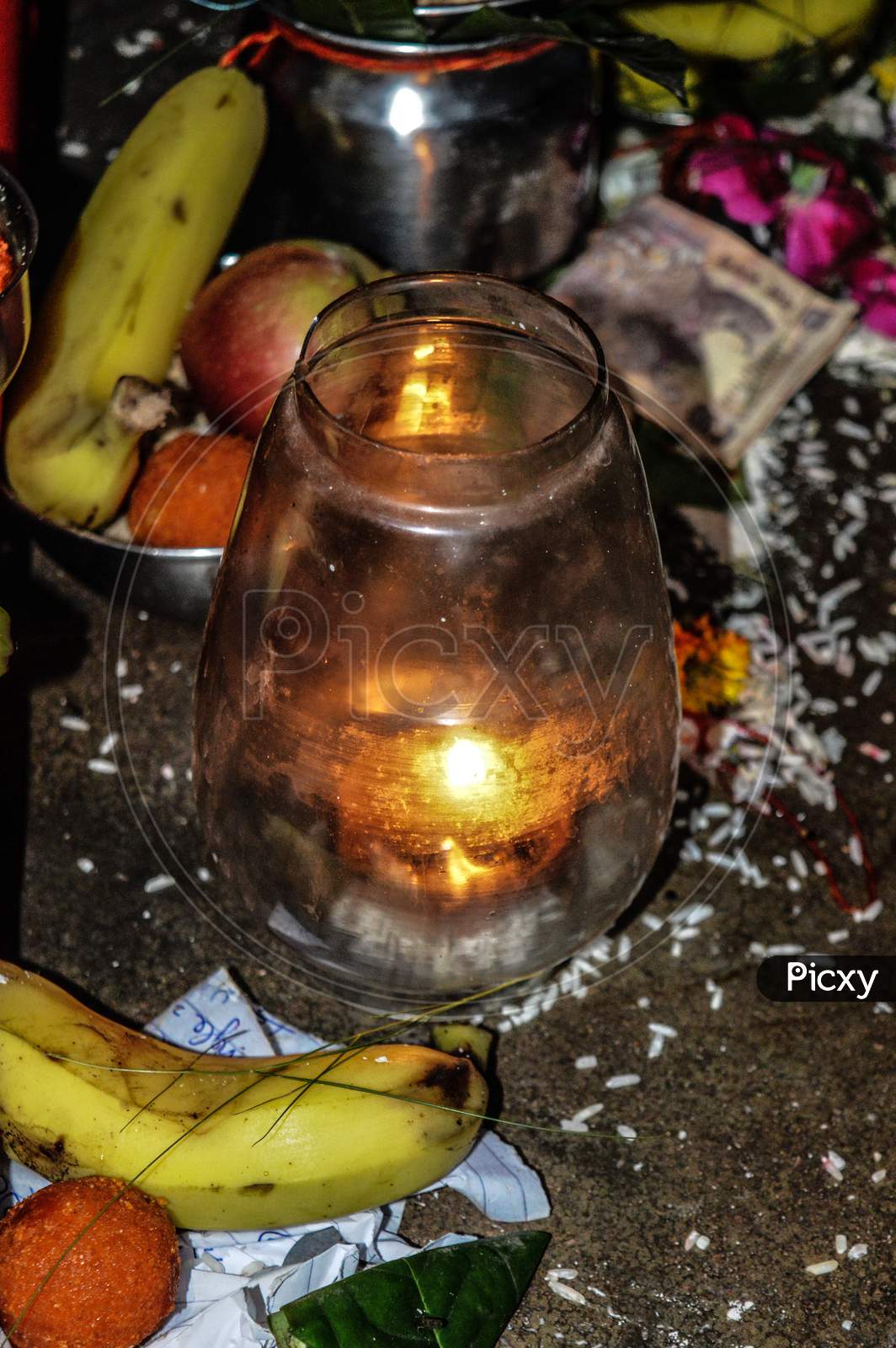 A Jar Is Which Is Loaded With Rose And Candle On Indian Festival Diwali Deepawali With Fire Isolated On Table
