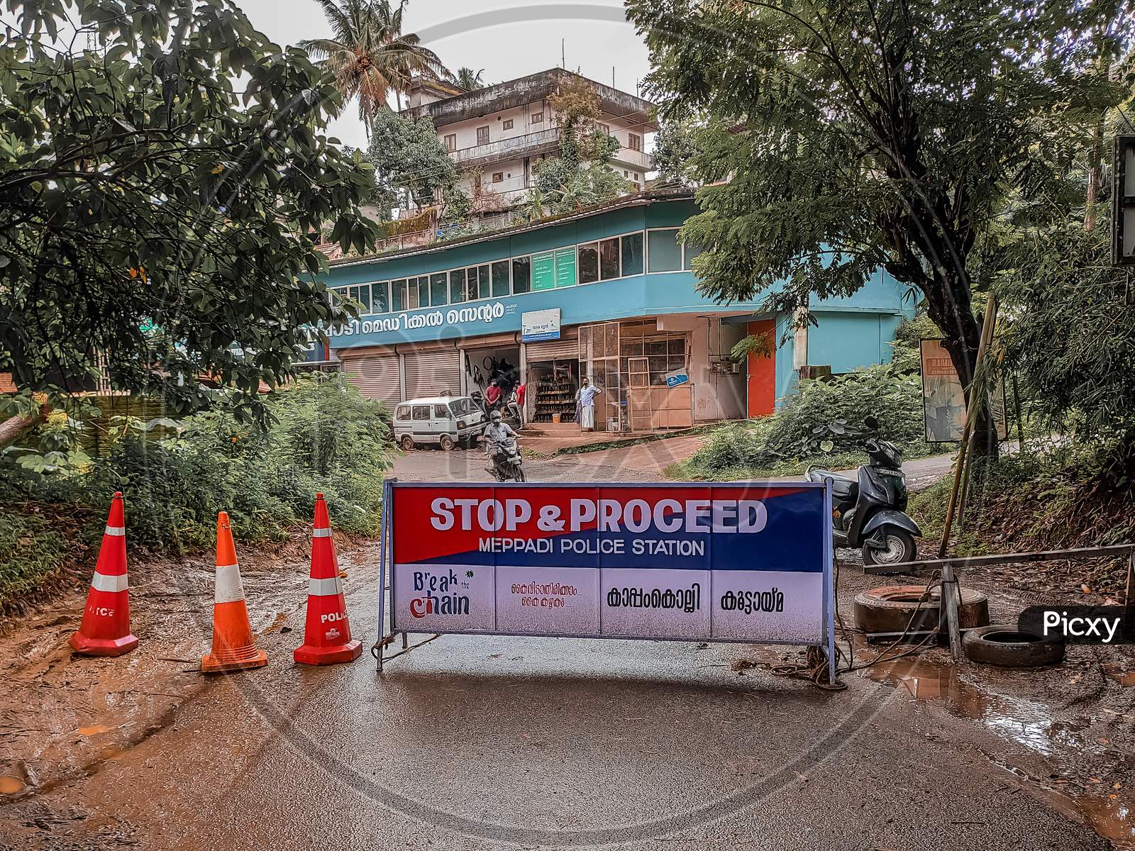 Meppadi, Kerala / India - 09.14.2020 : Road Blocked By Police In Containment Zone After A Person Was Tested Positive For Corona Virus. Covid-19 Pandemic.