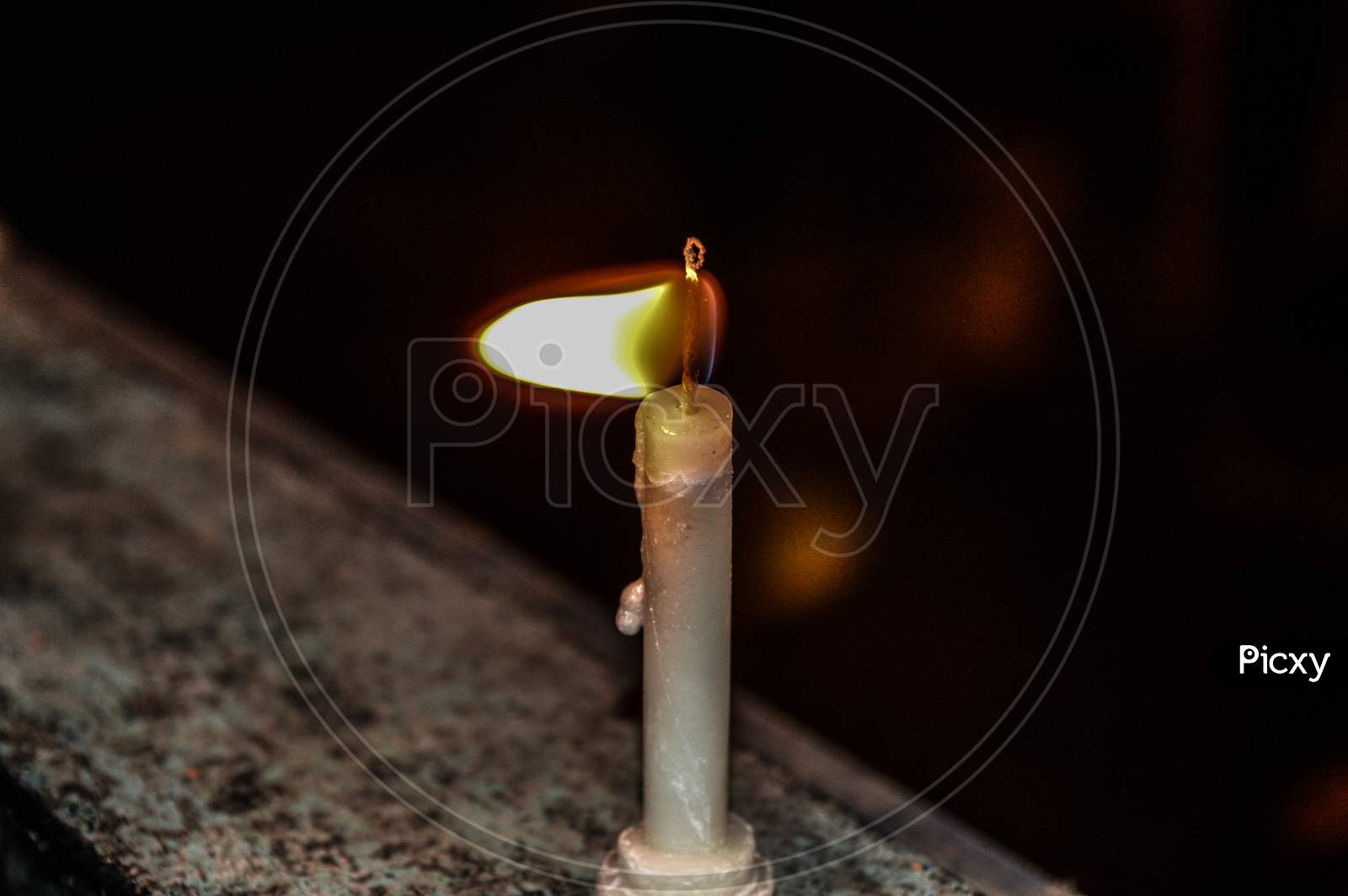 A Candle On Indian Festival Diwali Deepawali With Fire Isolated On Table