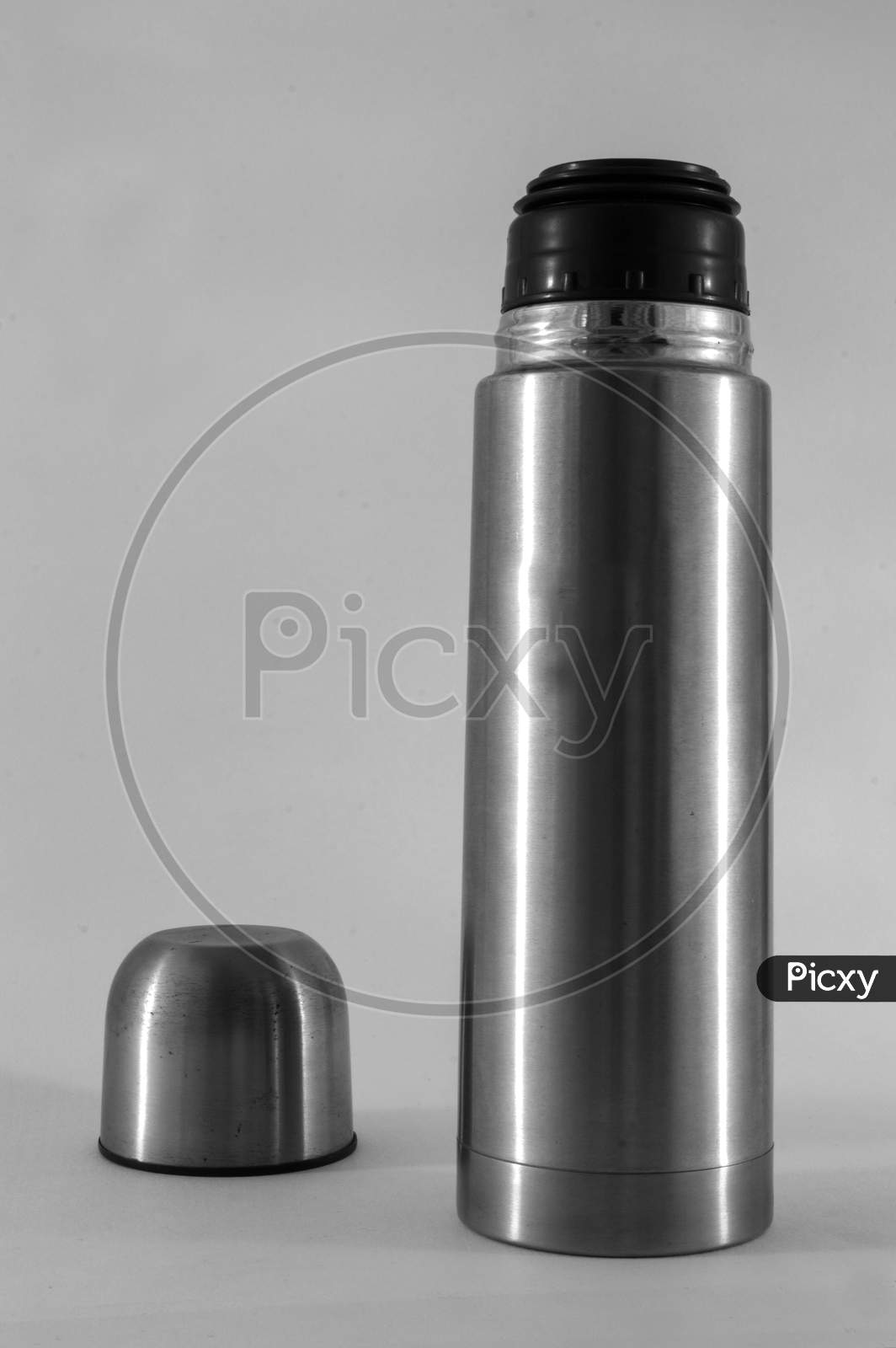 Stainless Steel Vacuum Flask Black And White Isolated On The White Background