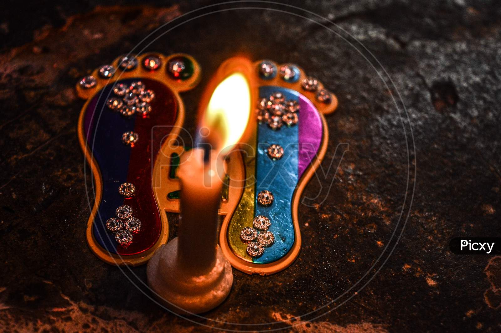 Footprint Of God On Indian Festival Diwali Deepawali With Fire Isolated On Table