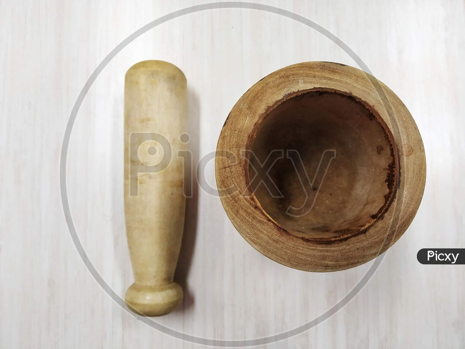 Wooden Mortar And Pestle Set/Khalbatta/ Hamandista With A White Background