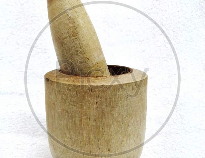 Wooden Mortar And Pestle Set/Khalbatta/ Hamandista With A White Background