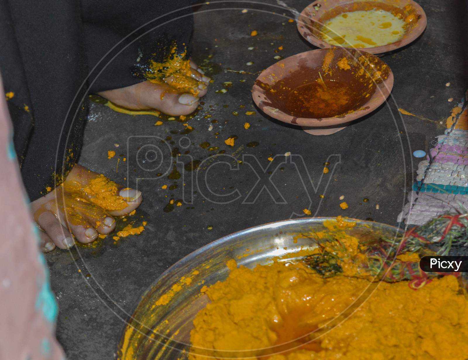 Closeup Shot Of Bride Feet On Haldi(Turmeric) Ceremony In One Of The Ritual In Indian Marriage.