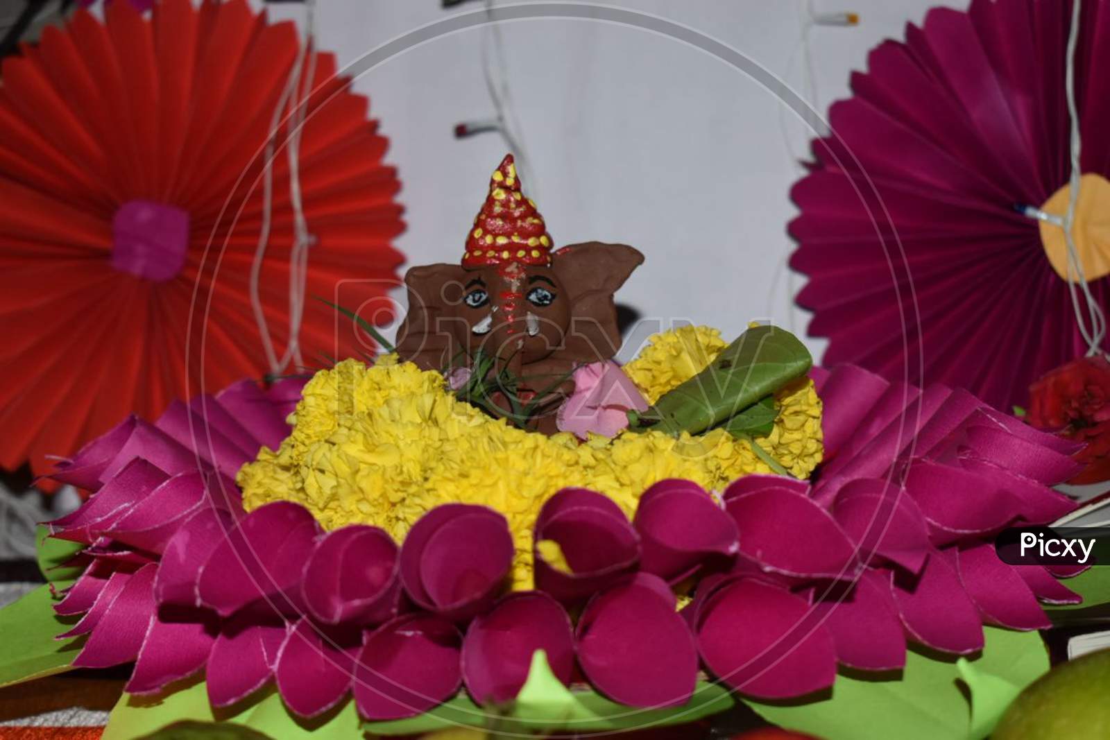 God Ganesha with beautiful flowers