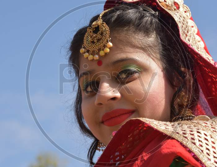 beautiful Kashmiri female dancer posing in the camera at Junagadh fort Bikaner