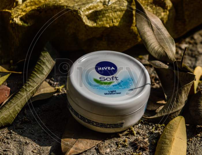 A Product Of Nivea Which Is Moisturize Your Skin Indian Product Isolated On Dusty Wooden At Morning