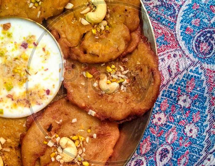 indian style malpua filled with goodness of dry fruits and banana