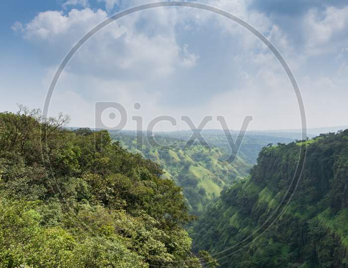 Panoramic View Of A Lush Green Valley On Winter Day At Satara, India