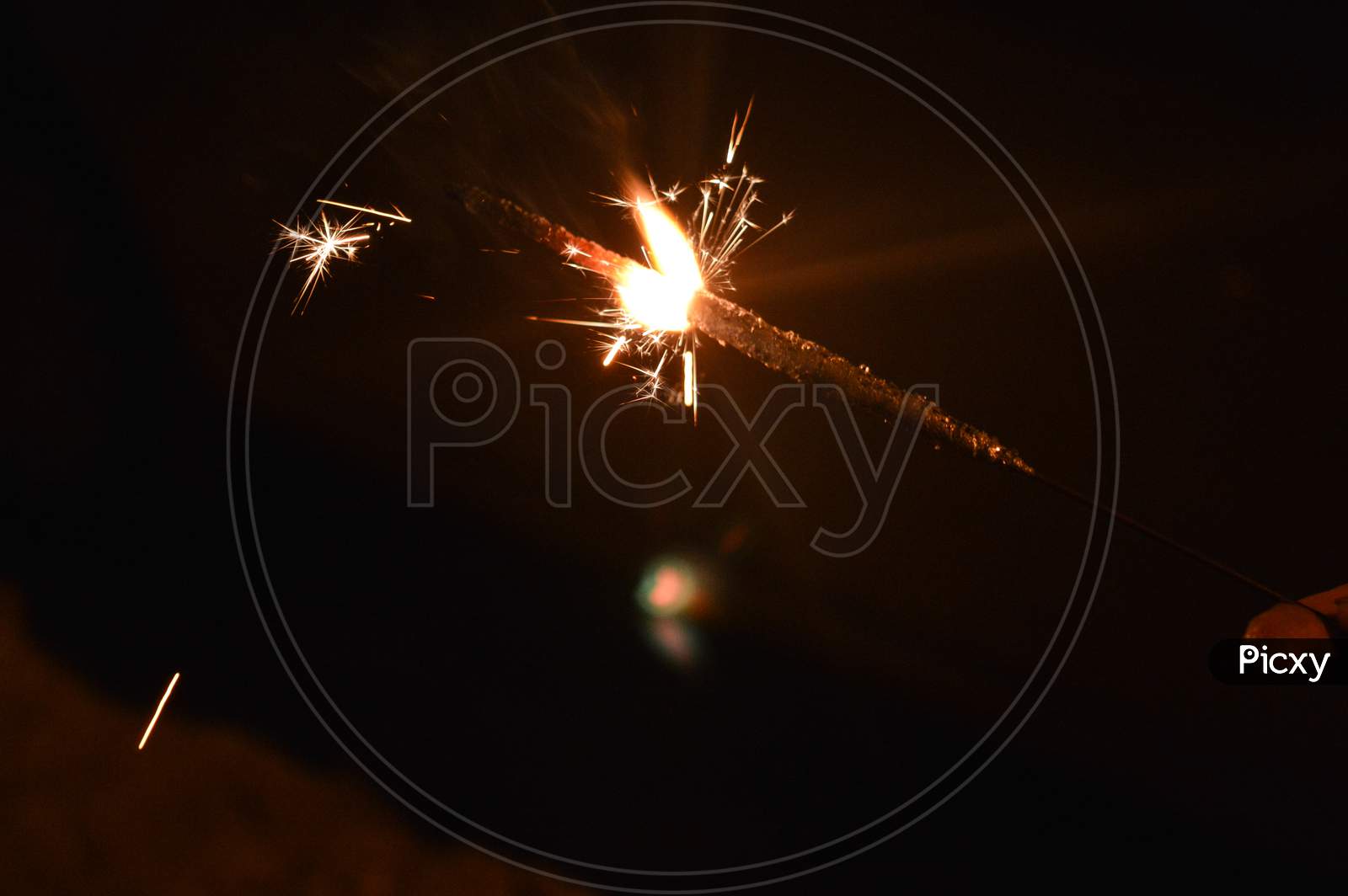 Indian Lady Playing With Fire Cracker Rose And Candle On Indian Festival Diwali Deepawali With Fire Isolated On Table
