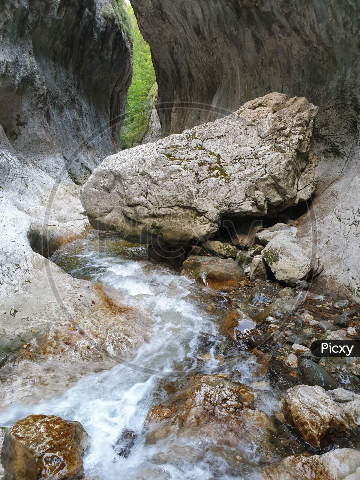 Huge Limestone Rock In Cheile Rametului River