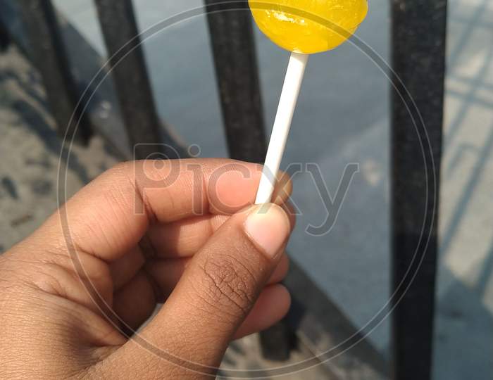 pineapple flavoured lollipop on street