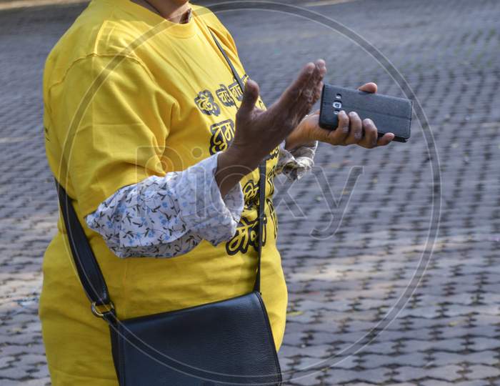 A Indian Lady Poses For Support The Cycle Ride To Celebrate International Women'S Day.