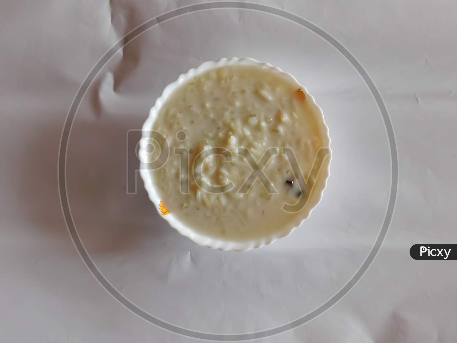 Closeup Of Delicious Sweet Dish(Payasam) In A Bowl Isolated On A White Surface