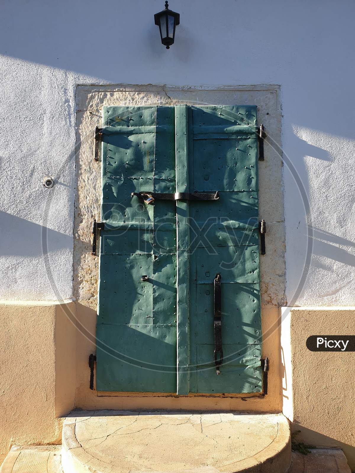 Closed Green Metal Door In Rimetea, Alba, Romania