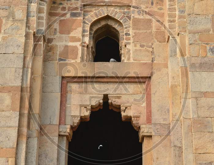 A Design At Gate Of Shish Gumbad Monument At Lodi Garden Or Lodhi Gardens In A City Park From The Side Of The Lawn At Winter Foggy Morning.