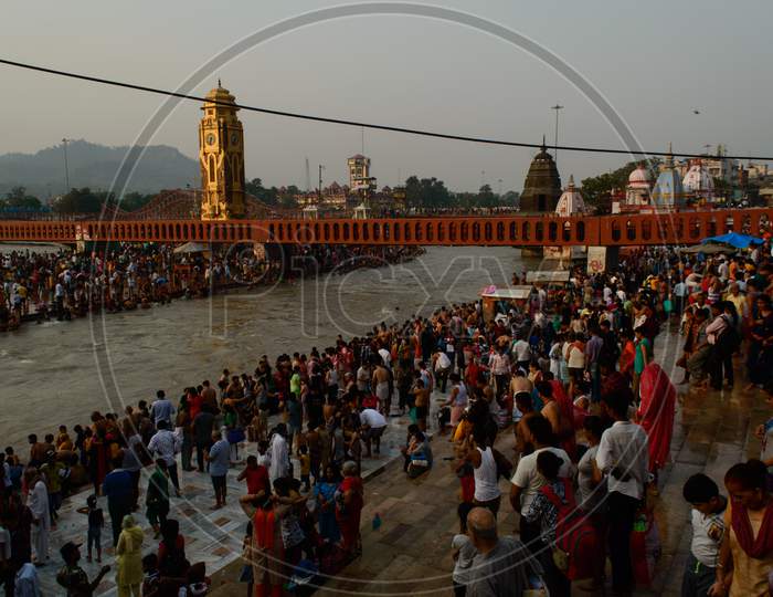 Heavy Crowd Going To Take Bath Into Ganga River Due To Saavan Festival At Haridwar Bridge Temple Sky.