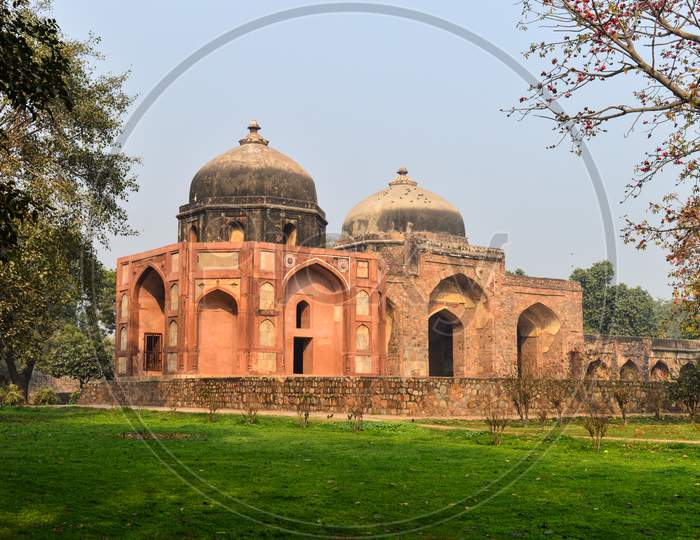 A Monument At Humayun Tomb Memorial From The Side Of The Lawn At Winter Foggy Morning.