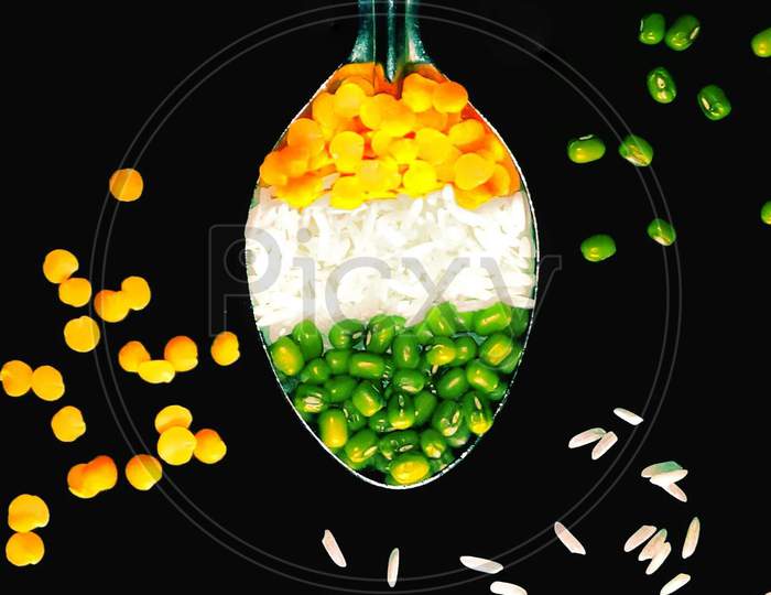 Photo of Tricolor created by pulses and grains.