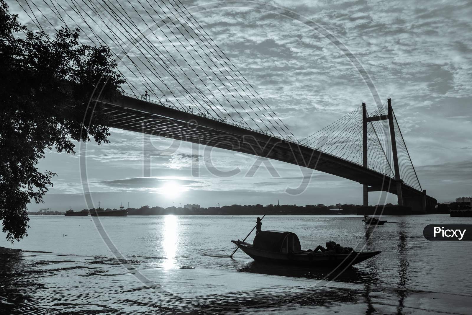 A view from princep ghat with vidyasagar setu and boat at evening time