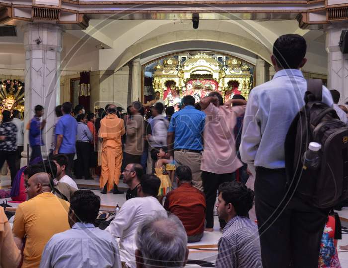 People Are Looking At God Lord Krishna And Praying For Good Wealth And Health On The Indian Festival Of Lord Krishna Birth Ceremony( Janmastami) At Iskcon Temple New Delhi, India.