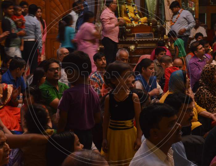 On The Indian Festival Of Lord Krishna Birth Ceremony( Janmastami) People Are Dancing, Enjoying, Celebrating, Raising Hand At Night At Iskcon Temple New Delhi, India.